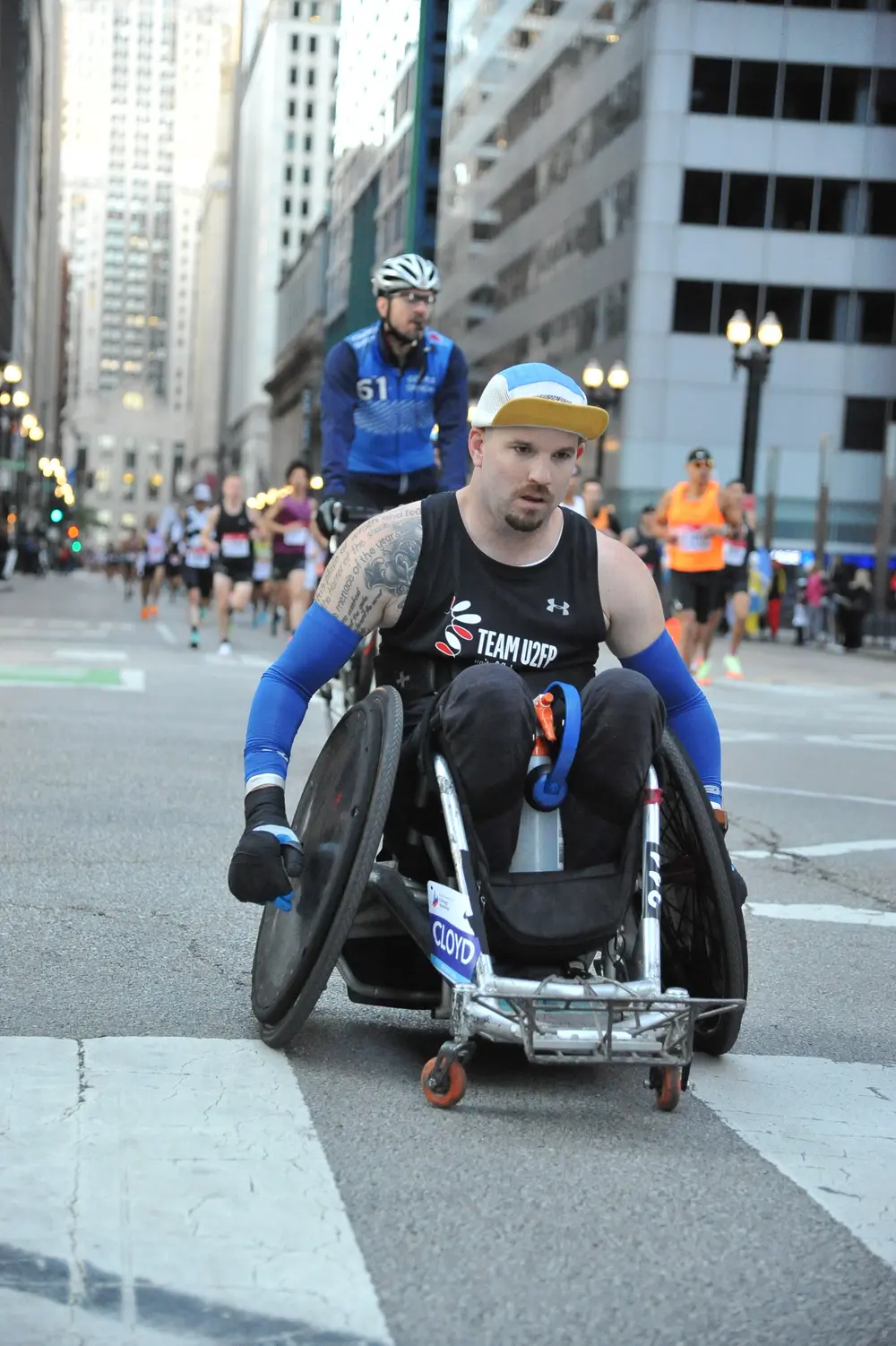 Thomas racing through downtown Chicago, focused on the road ahead